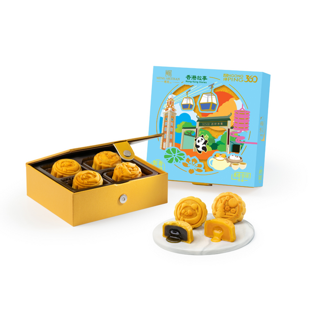 皇玥獨家與香港昂坪360聯名推出限定月餅。檸檬黃皮紋禮盒綴天藍色纜車線條，主視覺呈現昂坪纜車翱翔維港上空，襯以尖沙咀鐘樓剪影，現代感設計詮釋「空中看香港」的獨特體驗。